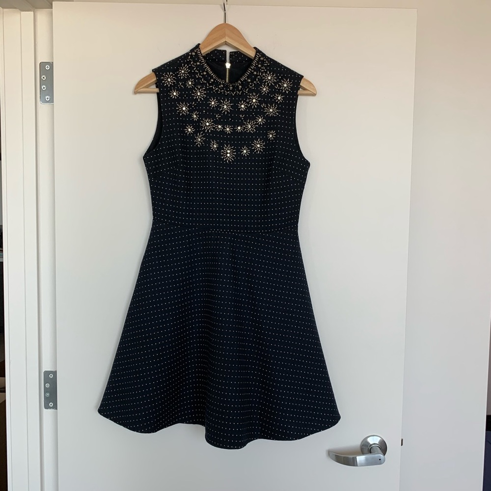 Dress embroidered with stone